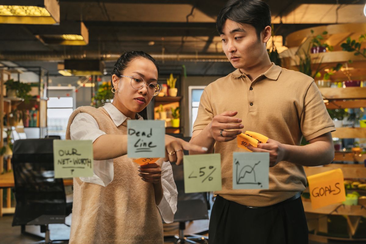 Team planning a digital product with sticky notes